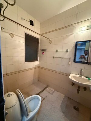 Bathroom in 3 BHK Builder Floor at Nehru Enclave – for Rent