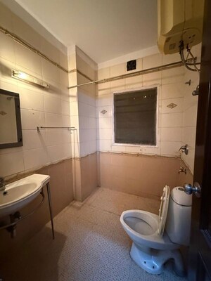 Bathroom in 3 BHK Builder Floor at Nehru Enclave – for Rent
