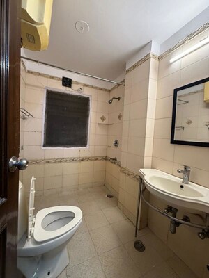 Bathroom in 3 BHK Builder Floor at Nehru Enclave – for Rent