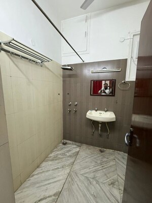 Bathroom in 3 BHK Builder Floor at Nehru Enclave – for Rent