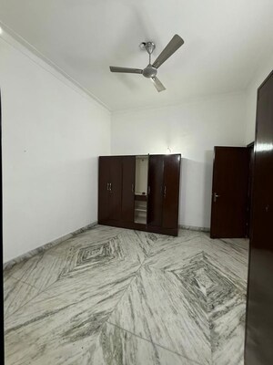Bedroom in 3 BHK Builder Floor at Nehru Enclave – for Rent