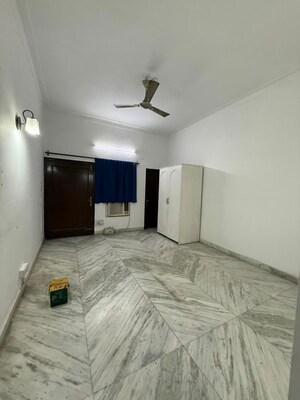 Bedroom in 3 BHK Builder Floor at Nehru Enclave – for Rent