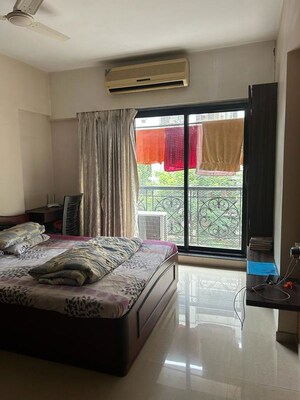 Bedroom in 2 BHK Apartment at Lalani Valentine Apartment, Malad East – for Rent