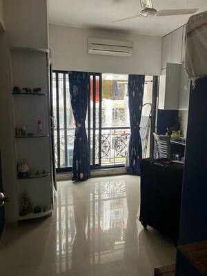 Living Room in 2 BHK Apartment at Lalani Valentine Apartment, Malad East – for Rent