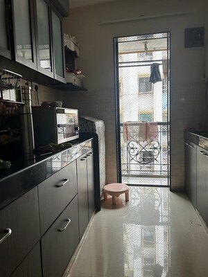 Kitchen in 2 BHK Apartment at Lalani Valentine Apartment, Malad East – for Rent