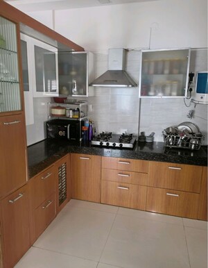 Kitchen in 2 BHK Apartment at Aakash Ganga Apartment, Pimple Saudagar – for Rent