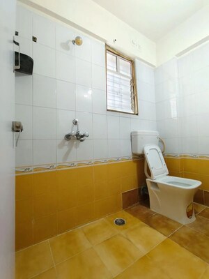 Bathroom in 2 BHK Apartment at Karve Nagar – for Sale