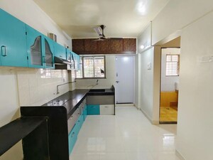 Kitchen in 2 BHK Apartment at Karve Nagar – for Sale