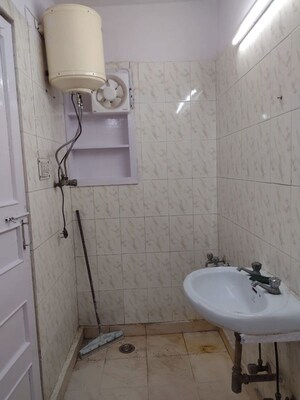 Bathroom in 2 BHK Builder Floor at East Of Kailash – for Rent