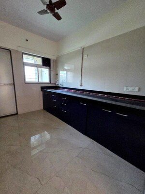 Kitchen in 2 BHK Apartment at Cosmos Habitat, Majiwada – for Rent