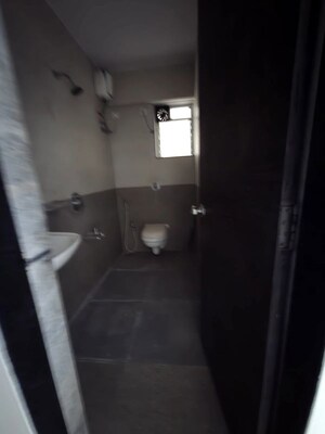 Bathroom in 2 BHK Apartment at Cosmos Habitat, Majiwada – for Rent
