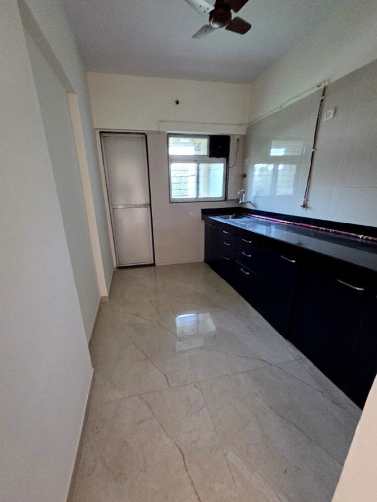 Kitchen, cosmos-habitat 2 Bedroom 700 Sq.Ft. Apartment In Majiwada Thane 10251412