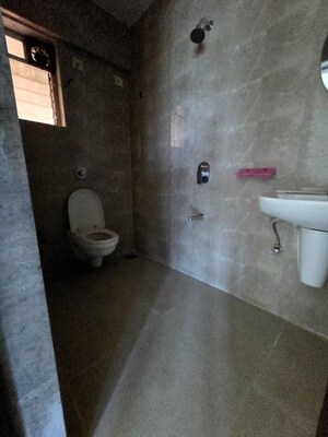 Bathroom in 2 BHK Apartment at Cosmos Habitat, Majiwada – for Rent