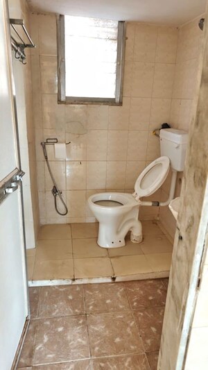 Bathroom in 3 BHK Apartment at Doordarshan CHS, Goregaon East – for Rent