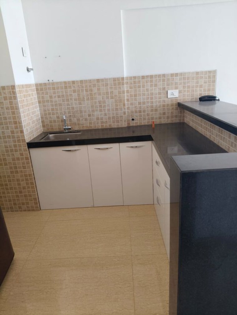Kitchen, lodha-belmondo Studio 600 Sq.Ft. Apartment In Gahunje Pune 10251415