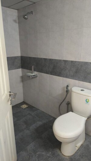 Bathroom in 3 BHK Apartment at Mantri Webcity, Hennur – for Rent