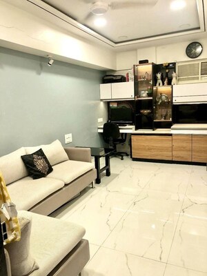 Living Room in 1 BHK Apartment at Khar West – for Rent