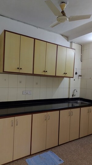 Kitchen in 3 BHK Apartment at Dosti Blossom, Wadala East – for Rent