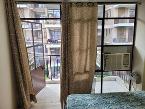 Living Room in 1 BHK Apartment at Signature Global Synera, Sector 81 – for Sale