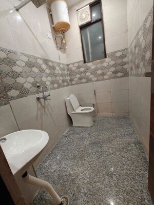 Bathroom in 5 BHK Builder Floor at Niti Khand I – for Sale