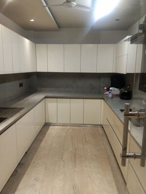 Kitchen in 3 BHK Apartment at Panchsheel Enclave – for Rent