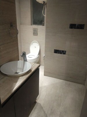 Bathroom in 3 BHK Apartment at Panchsheel Enclave – for Rent