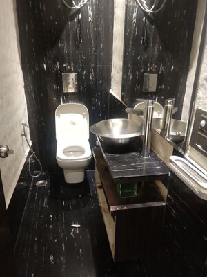 Bathroom in 3 BHK Apartment at Panchsheel Enclave – for Rent