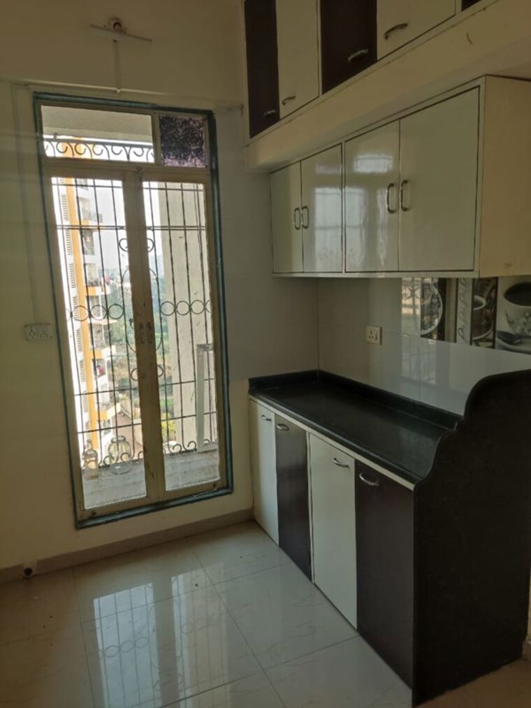 Kitchen, guru-sharan-chs 1 Bedroom 670 Sq.Ft. Apartment In Badlapur West Thane 10253053