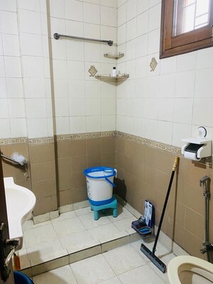 Bathroom in 2 BHK Builder Floor at Kalkaji – for Rent