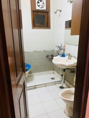 Bathroom in 2 BHK Builder Floor at Kalkaji – for Rent