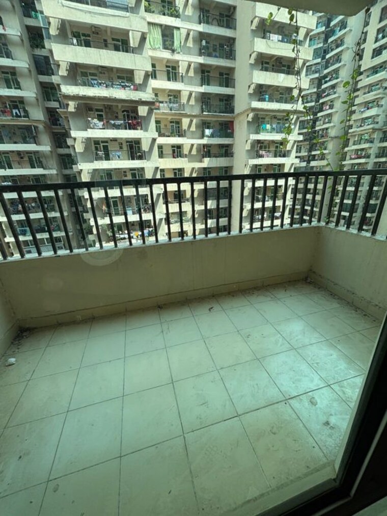 Balcony, gaur-atulyam 3 Bedroom 1300 Sq.Ft. Apartment In Omicron I Greater Noida Greater Noida 10253424