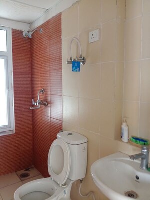 Bathroom in 2.5 BHK Apartment at Mahagun Mywoods, Sector 16c Greater Noida – for Rent
