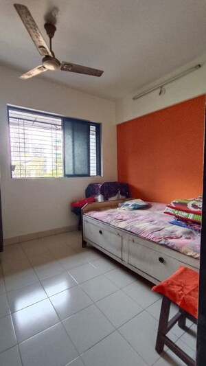 Bedroom in 1 BHK Apartment at Devdutt CHS, Dombivli West – for Rent