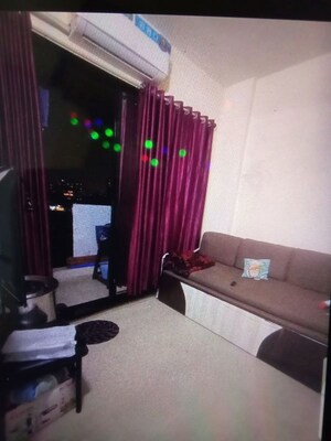 Living Room in 1 BHK Apartment at Devdutt CHS, Dombivli West – for Rent