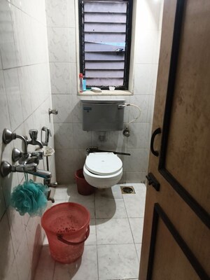Attached Bathroom in 2 BHK Apartment at Vile Parle West – for Rent