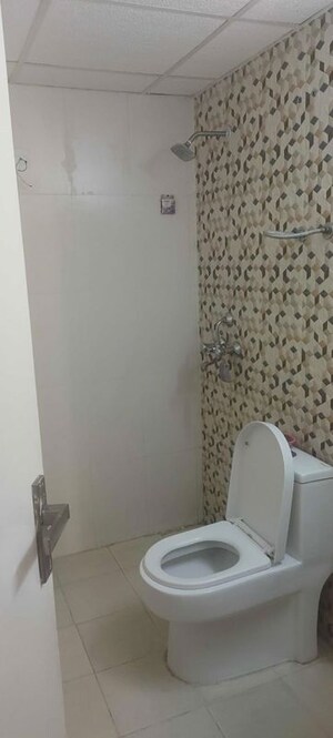 Bathroom in 2.5 BHK Apartment at Nilaya Greens, Raj Nagar Extension – for Sale
