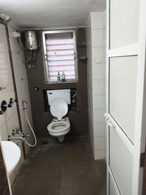 Attached Bathroom in 2 BHK Apartment at Vile Parle West – for Rent