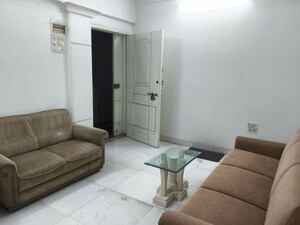 Living Room in 2 BHK Apartment at Vile Parle West – for Rent