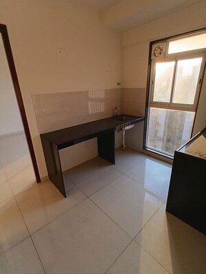 Kitchen in 1 BHK Apartment at Godrej Tranquil, Kandivali East – for Rent