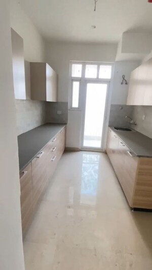 Kitchen in 3.5 BHK Apartment at ATS Homekraft Pious Orchards, Sector 150 – for Sale