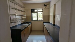 Kitchen in 2 BHK Apartment at Lodha Splendora, Ghodbunder Road – for Sale