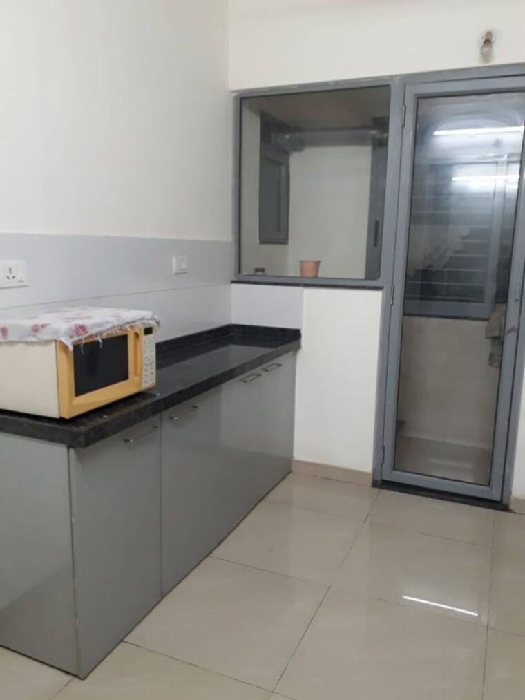 Kitchen, rion-zen-square 3 Bedroom 1200 Sq.Ft. Apartment In Kharadi Pune 10254458