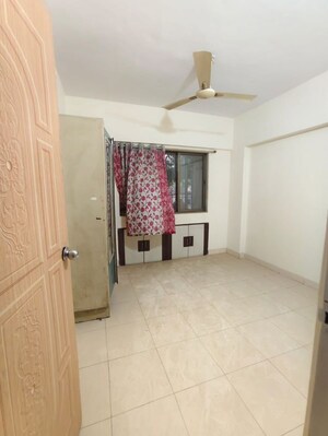 Bedroom in 2 BHK Apartment at Vijay Apartments Waghbil, Waghbil – for Rent