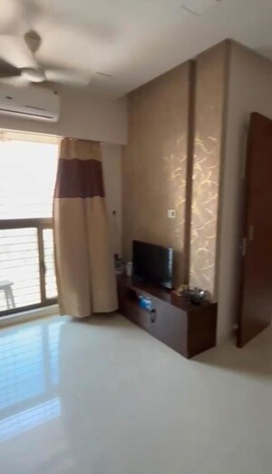 Living Room in 1 BHK Apartment at Ashray Jaswanti Woods, Mulund West – for Sale