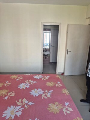 Room in 2.5 BHK Apartment at Mahindra Aura, Sector 110a – for Rent