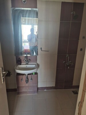 Bathroom in 2.5 BHK Apartment at Mahindra Aura, Sector 110a – for Rent