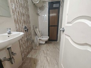 Bathroom in 2 BHK Apartment at MM Spectra, Chembur – for Rent