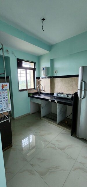 Kitchen in 2 BHK Apartment at Dss Mahavir Estella, Ghodbunder Road – for Rent