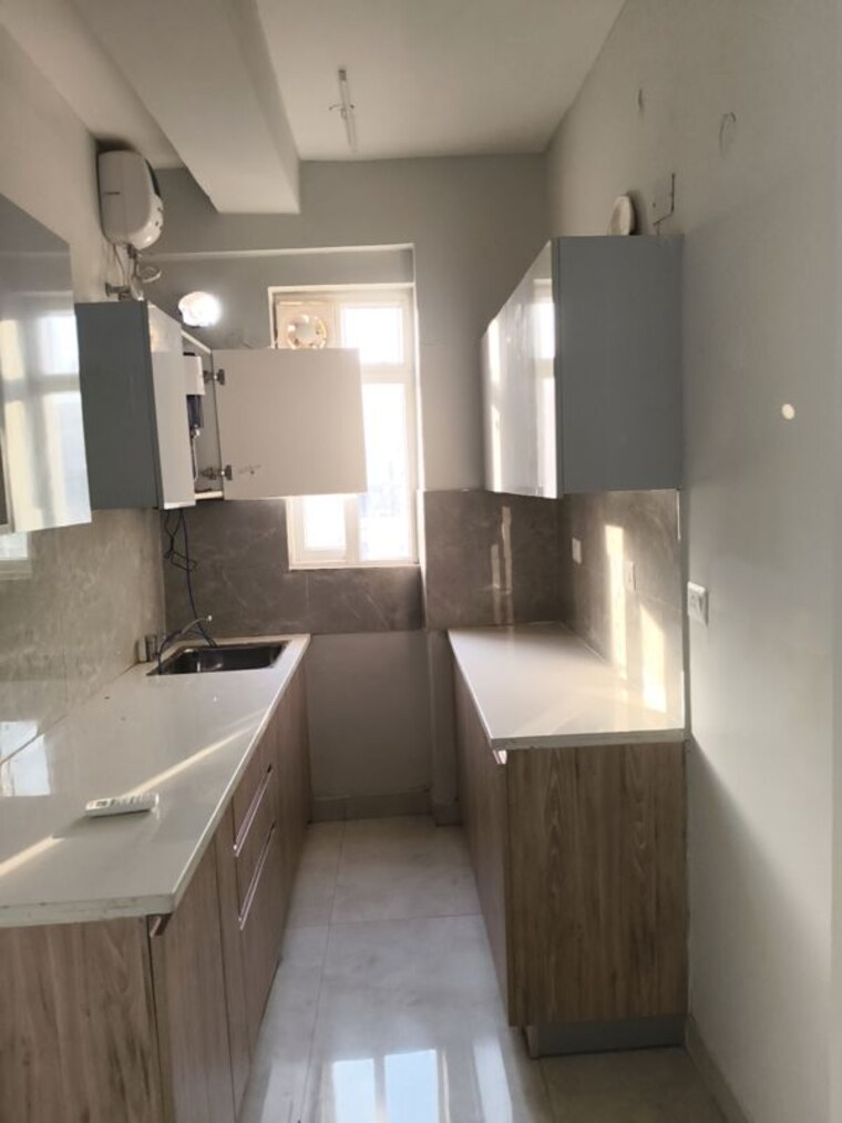 Kitchen, shapoorji-pallonji-joyville-gurgaon 2 Bedroom 915 Sq.Ft. Apartment In Sector 102 Gurgaon 10254668