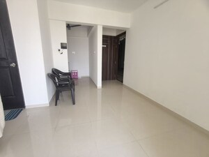 Living Room in 1 BHK Apartment at Ganraj Skydale, Mohammadwadi – for Rent